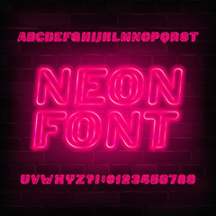 Red neon alphabet font. Neon color light bulb oblique letters and numbers. Stock vector typeface for your typography design.