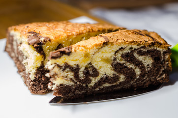 a cutted cake zebra on the cake server