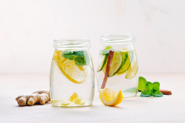 Bottle with detox water with lemon, ginger and mint