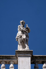 Obraz premium Statue at the top of National Library of St Mark`s Biblioteca Marciana, Venice, Italy, UNESCO World Heritage Sites