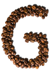 Roasted coffee bean letter G isolated on white