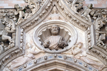 Saint Mark the Evangelist, detail of the Doge Palace, St. Mark Square, Venice, Italy, UNESCO World Heritage Sites.