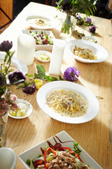 Food on table with flowers