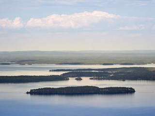 Summer landscape view over the lake Pielinen from the top of the UkkoKoli, a fell at the national park Koli, Joensuu, Finland, the land of a thousand lakes.