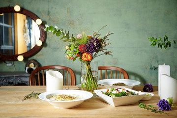 Food on table with flowers