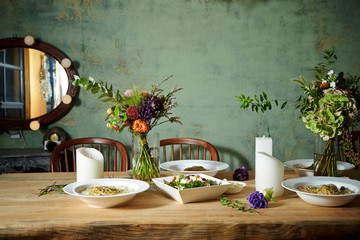 Food on table with flowers