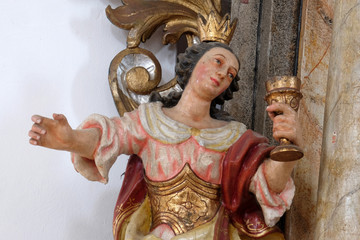 Statue of Saint Barbara on the altar of Our Lady in the Church of Assumption of the Virgin Mary in Pokupsko, Croatia