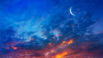 Naklejka na ściany i meble New moon. Prayer time. Generous Ramadan. Mubarak background. A decline or rising with clouds.