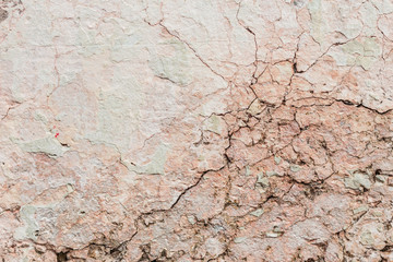 Wall fragment with scratches and cracks
