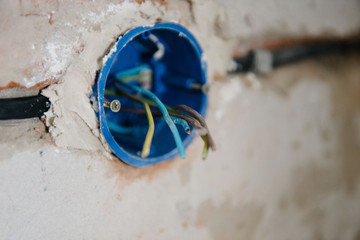 Hole in wall for electrical outlet