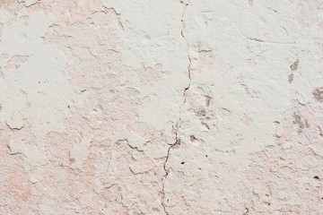 Wall fragment with scratches and cracks