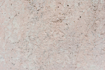 Wall fragment with scratches and cracks