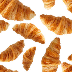 Seamless pattern with French croissants isolated on white. Top view. Bakery background. Food texture. Close-up photo.