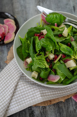 Spinach salad on white plate