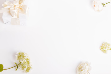 Festive flower composition on the white background. Overhead view