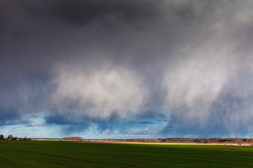 Fototapeta na wymiar Cloudy day in countryside.