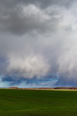 Obraz na płótnie Canvas Cloudy day in countryside.