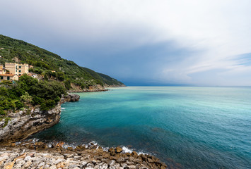 Fototapeta na wymiar Coastline and Mediterranean Sea in Liguria Italy - Tellaro village
