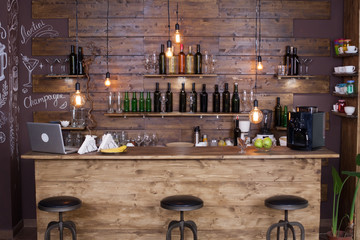 Coffee shop bar counter with wine bottles