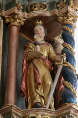 Fototapeta premium Saint Barbara, statue on the altar of Saints Cyril and Methodius in Church of Birth of Virgin Mary in Svetice, Croatia