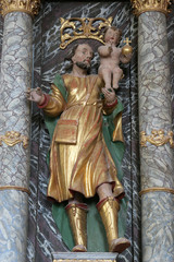 Saint Cristopher, statue on the altar of Saint John of Nepomuk in Church of Birth of Virgin Mary in...