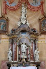 Fototapeta na wymiar Altar of Saint Michael in Church of Assumption of Virgin Mary in Zakanje, Croatia 