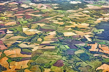 earth aerial view satellite overview of agriculture field and rural green nature land countryside landscape sight from above on grass farm country agricultura farming ground environment background