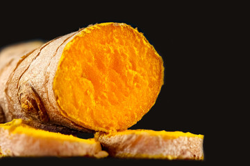 turmeric root close-up, concept healthy Ayurveda food