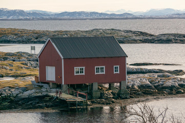Buildings waterfront for boats, Norwegian seacoast