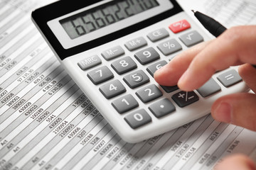 Businessman working and calculating finance. Business financial accounting concept. Closeup hands.