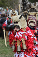 Zemen, Bulgaria - March 16, 2019: Masquerade festival Surva in Zemen, Bulgaria. People with mask called Kukeri dance and perform to scare the evil spirits.