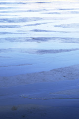 Fototapeta na wymiar texture ice / broken texture blue background ice, cold winter background cracks, reflection