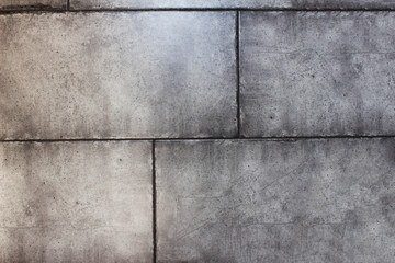 Texture of gray fashionable wall of concrete blocks, close-up, background, toughness