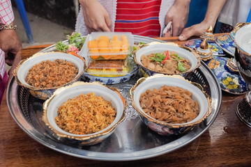 Traditional Mon food and dessert in the plate.