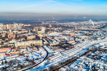 Fototapeta na wymiar Aerial view of the modern city district. Winter, sunny day