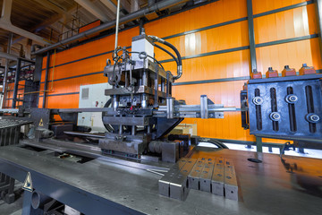 Roller forming machine. The interior of the plant producing a metal profile.