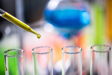 Lab glassware containing chemical liquid in laboratory