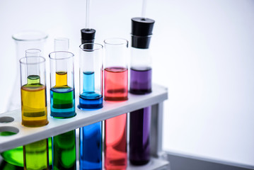 Test tube containing chemical liquid in laboratory, lab chemical research and development concept 