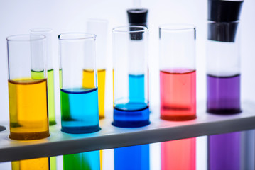 Test tube containing chemical liquid in laboratory, lab chemical research and development concept 