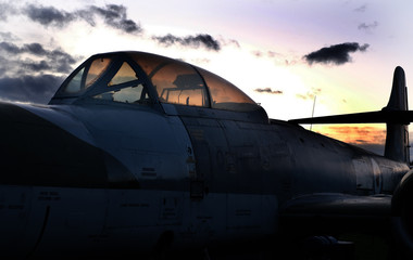 Fototapeta na wymiar Evening sky and cockpit canopy of Gloster Meteor night fighter variant.