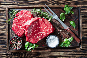 overhead view of raw beef steaks, top view