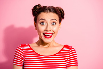 Close up photo funky beautiful she her lady pretty hairdo two buns not believe such luck eyes big mouth opened ecstatic bright pomade wear casual striped red white t-shirt isolated pink background
