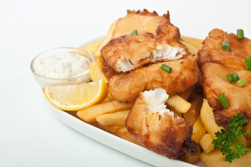 fish and chips on a plate on white background