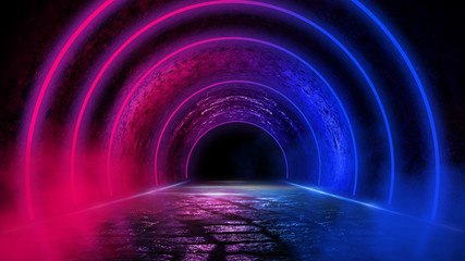 Background of an empty dark room with a concrete floor, multicolored neon circles in the center, neon light and multi-colored smoke.  Night view, round tunnel, corridor. Abstract light.