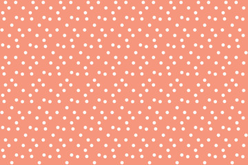 Peach colour background in white dots seamless pattern