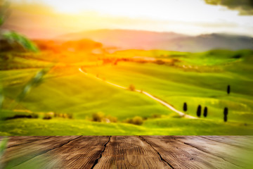 Desk of free space for your decoration and spring landscape of tuscany 