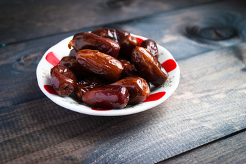 Saucer of date fruits