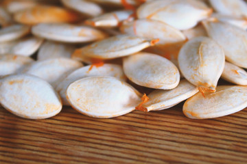 Pumpkin seeds. Close-up. Background. Texture.
