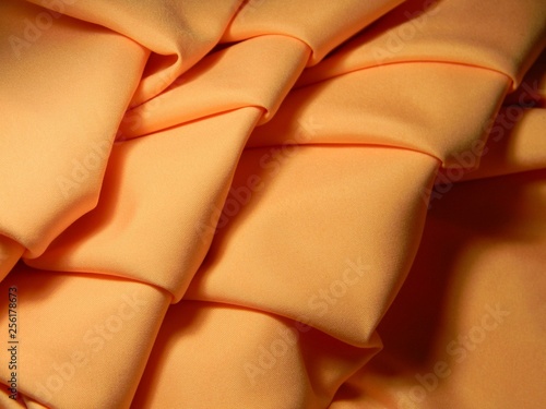 Peach Colored Plain Cotton Wavy Fabric Texture Background