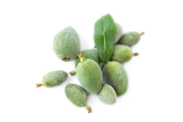 Fresh green almonds (cagla) isolated on white background
